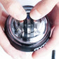 Auto-start gyroscopic wrist and forearm strengthener ball by Fitnessniches, showcasing its sleek design and spinning motion.